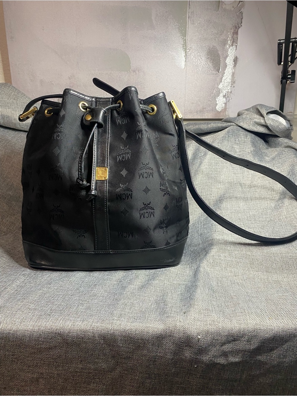 MCM Black Logo Jacquard Drawstring Bucket Bag with Gold Accents